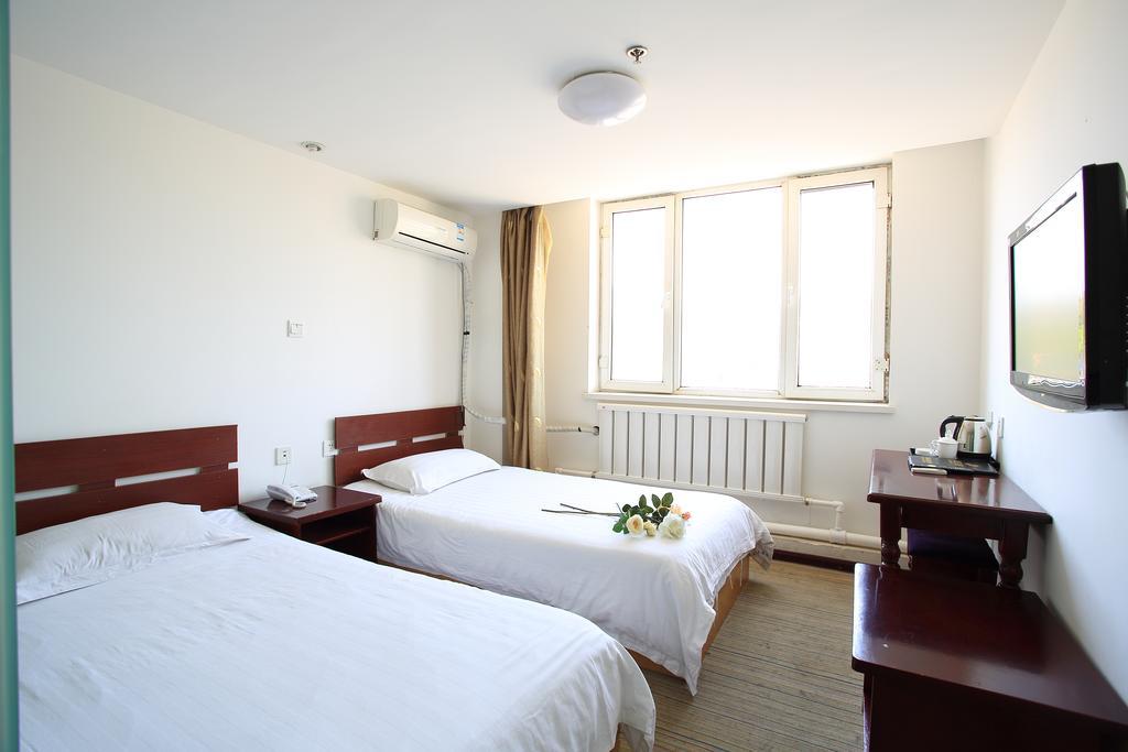 Dalian Haiyuwang Hotel Habitación foto